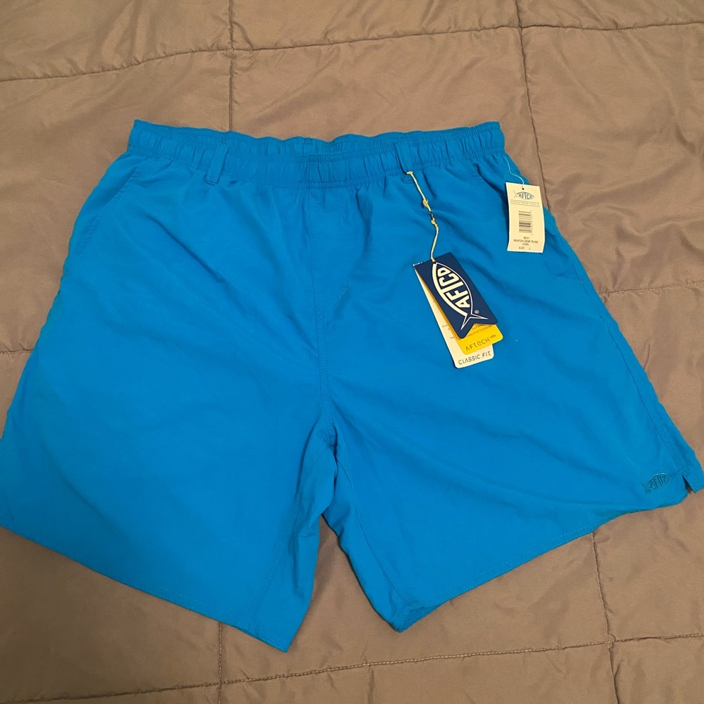 AFTCO classic fit mesh swim trunks. Never worn!
